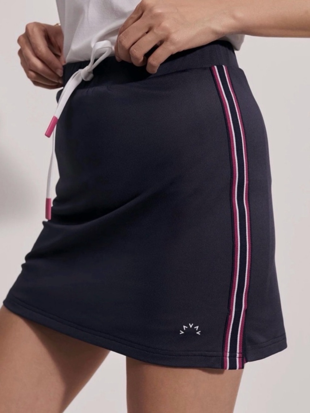 Varley navy Tennis Skirt with Pink Stripe Detail NWOT
